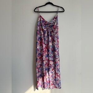 floral midi dress. lightweight satin with a vibrant floral pattern.
